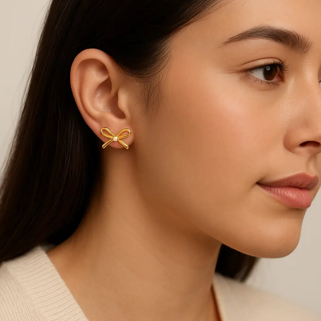 Gold Ribbon Bow Earrings with White Crystal