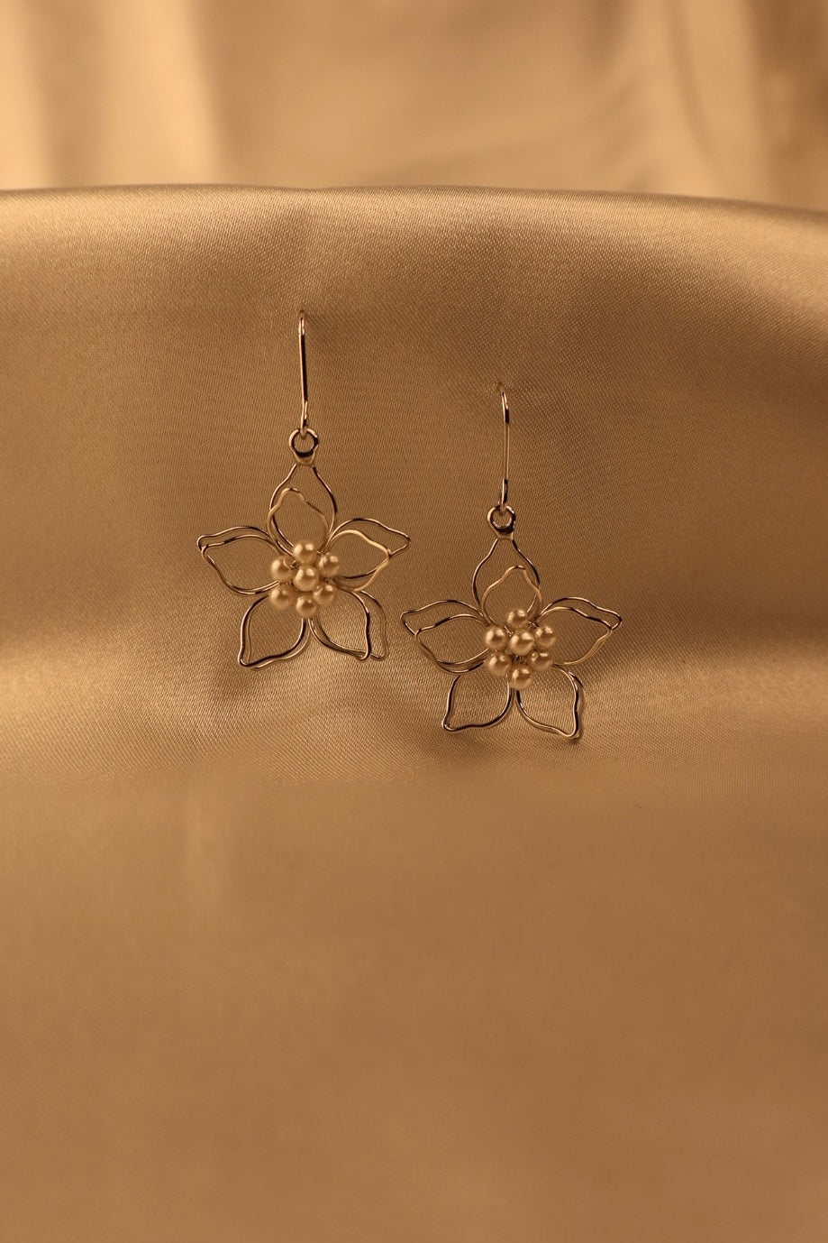 silver wired flower with pearls