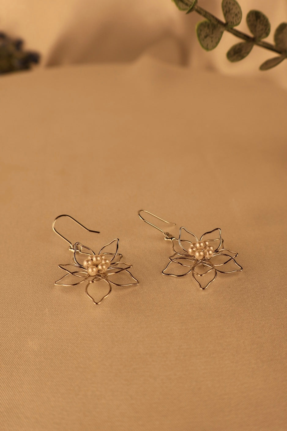 silver wired flower with pearls