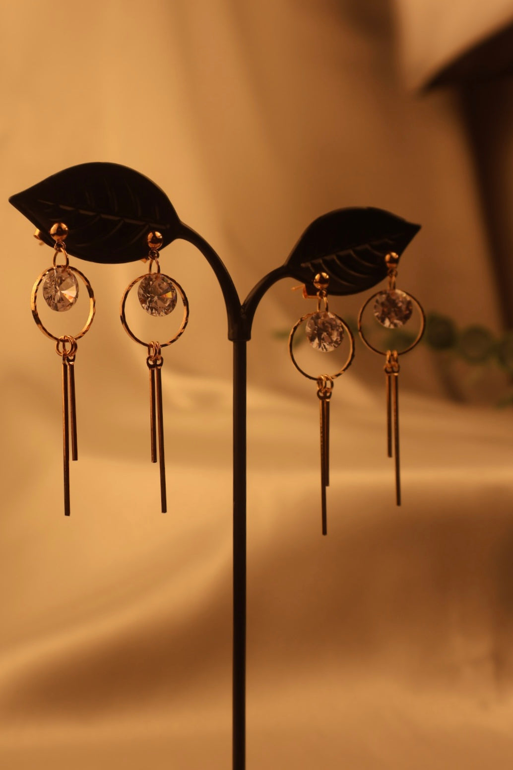 rose gold stone in circle hanging