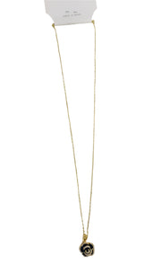 gold chain with black flower pendent