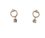 rose gold circle with white single stone